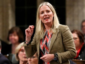 Environment Minister Catherine McKenna stands in the House of Commons during Question Period.