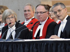 The Supreme Court of Canada has upheld a decision by Robert  Bauman, Chief Justice of B.C., that allows judges from B.C. to conduct hearings outside the province. Also shown in this 2011 photo are Beverley  McLachlin, Chief Justice of Canada (left) and then Chief Justice of the British Columbia Court of Appeal, Lance Finch