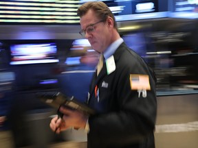 U.S. markets were also lower after the weaker-than-expected September jobs report had little effect on the prospects of an interest rate hike by the year end.