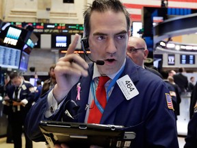 North American stocks look set for a slightly higher open today, buoyed by better-than-expected quarterly reports.