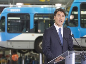 Prime Minister Justin Trudeau makes an infrastructure announcement at a municipal bus depot on July 5, 2016 in Montreal.