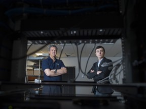 George Burger, an advisor with VMedia and Alexei Tchernobrivets, Chief Executive Officer of VMedia, pose for a portrait at the companies offices in Toronto, Friday July 17, 2015.