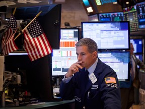 Traders work on the floor of the New York Stock Exchange