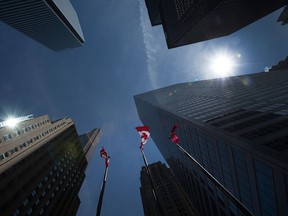 Sunlight shines down on Toronto's business district, April 15, 2016.