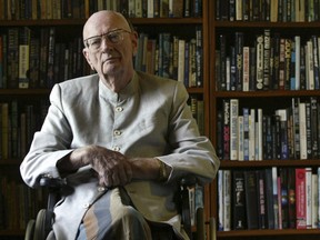 In this May 9, 2007 file photo, science fiction writer Arthur C. Clarke poses at his home in Colombo, Sri Lanka.