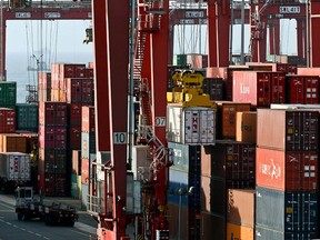 Containers are stacked in the port of El Callao, Peru, on Nov. 17, 2016.