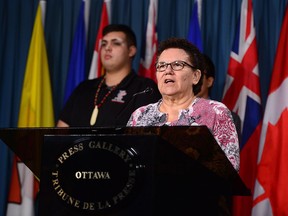 Tsleil-Waututh Nation Chief Maureen Thomas and community members hold a news conference on Parliament Hill in Ottawa on Monday, Nov. 28, 2016, to deliver an urgent message to the Prime Minister regarding a decision on Kinder Morgan permit.