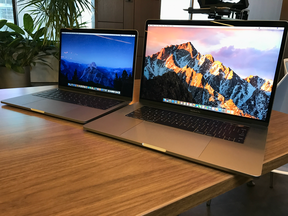 The new 2016 MacBook Pro with Touch Bar 13-inch model (left) and 15-inch model (right.