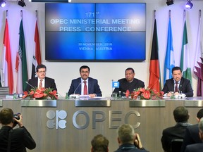 From left to right, Mohamed Hamel, chairman of OPEC, Mohammed Al-Sada, Qatar's minister of energy and industry and president of OPEC, Mohammed Barkindo, secretary general of OPEC, and Hasan Hafidh, head of public relations of OPEC, attend a news conference