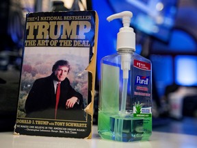 The book "The Art Of The Deal" by U.S. President-elect Donald Trump sits on a desk on the floor of the New York Stock Exchange.