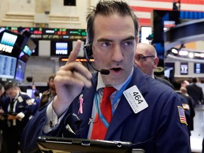 Wall Street is also up, with the Nasdaq hitting a record intraday high, helped by a jump in technology shares and as higher oil prices boosted energy stocks.