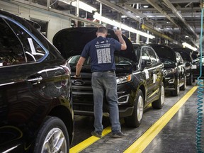Ford will spend $100 million for a "refresh," or updated version, of the Ford Edge SUV and Lincoln MKX and MKT models assembled in Oakville.
