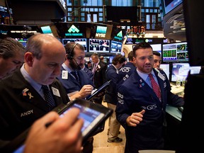 Traders work on the floor of the New York Stock Exchange on Nov. 18, 2016.