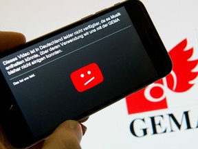 The message displayed on a smartphone when a video could not be shown on YouTube in Germany before the deal was reached.