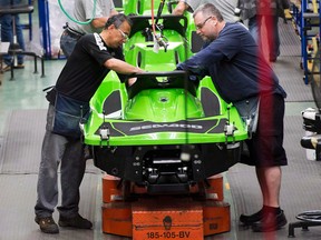 Employees work on the assembly line at the BRP plant in Valcourt, Que. The company has three manufacturing facilities in Mexico, including one in Juarez that just opened in April.