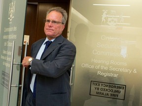 David Phillips, founder of First Leaside Group, leaves the Ontario Securities Commission during a hearing in 2013.