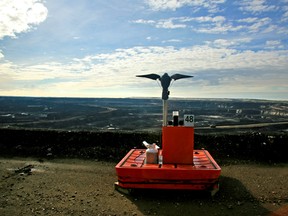 A mechanical wild bird deterrent sits on the edge of oil sands pit at a one of Shell Albian Sands' mines. Shell Albian Sands, north of Fort McMurray, is an Athabasca Oil Sands Project (AOSP).