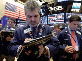 North American markets look headed for a slightly higher open today as investors cashed in on some of their recent bets on the so-called Trump rally.