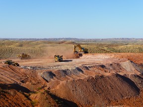 Trial mining at Beatons Creek utilizing simple equipment. No drilling and blasting required. This bench generated 30,000 tonnes of mineralized conglomerates that was subsequently treated in Novo gravity test plant.