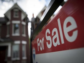 A home for sale, real-estate, house for sale, for sale sign, in Toronto