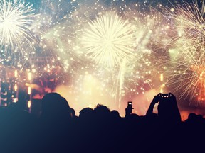 Cheering crowd and fireworks - New Year concept