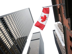 U.S. bank shares may be riding high, but Canadian banks will likely be weighed down in 2017 by a sluggish economy and a dovish central bank.
