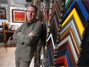 Small business owner Bernard Drouin stands in his 17th Avenue Framing shop. His business property tax assessment for the building has doubled since last year. GAVIN YOUNG/POSTMEDIA