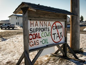 Residents of Hanna, Alta. have erected a sign showing their feelings about government policies as seen on Tuesday, Dec. 13, 2016.