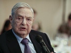 Investor George Soros has called U.S. President Donald Trump a "con man."