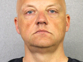 In this handout provided by the Broward Sheriff's Office, suspect Oliver Schmidt, an executive for Volkswagen poses in this undated booking photo.  Schmidt was arrested Jan. 7 in Florida in the Volkswagen emissions scandal.