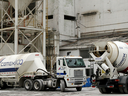 Cemex SA cement trucks sit at the Cemento Mexicano plant in Mexico City.