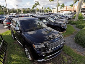 Jeep Grand Cherokees are displayed at a dealership in Florida. The U.S. government has alleged that Fiat Chrysler installed and failed to disclose to regulators software that allowed the vehicle to emit nitrous oxide above the allowable limits.