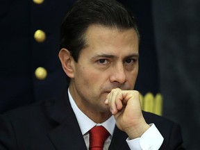 Mexico's President Enrique Pena Nieto pauses during a press conference at Los Pinos presidential residence in Mexico City, Monday, Jan. 23, 2017. Pena Nieto said Monday that Mexico's attitude towards the Donald Trump administration should not be aggressive or biased, but one of dialogue.