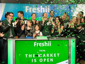 Matthew Corrin (centre) Freshii founder and CEO at the company's IPO with family, friends and employees at the TMX Exchange in Toronto, Tuesday January 31, 2017.