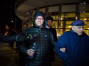 Mark Nordlicht, co-founder of Platinum Partners, left, exits federal court in the Brooklyn borough of New York, U.S., on Monday, Dec. 19, 2016.