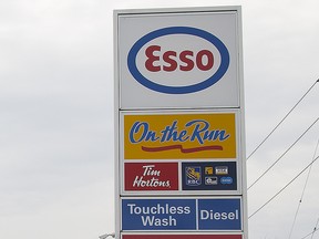 Motorists line up for the cheapest gas in Canada at the Esso station on Ontario St. in St. Catharines on Wednesday, Oct. 21, 2015.