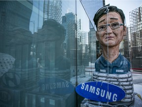 An effigy of Jay Y. Lee, co-vice chairman of Samsung Electronics Co., stands outside the Samsung's Seocho office building in Seoul, South Korea, on Friday, Jan. 13, 2017. Prosecutors questioned Samsung vice chairman and heir apparent Jay Y. Lee for about 22 hours in an influence-peddling probe that has reached the highest levels of government and business in South Korea.