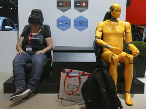 Virtual reality with a crash test dummy at the sneak peek of what to see at this year's 2017 Canadian International Auto Show that is about to hit the road