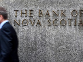 Bank of Nova Scotia, Canada's third-biggest lender, reported improved first-quarter earnings.