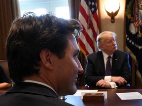 Prime Minister Justin Trudeau and U.S. President Donald Trump take part in a business roundtable discussion at the White House in Washington, D.C. on Monday, Feb. 13, 2017.