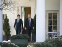 U.S. President Donald Trump, right, speaks with Justin Trudeau, Canada's prime minister, while leaving the Oval Office of the White House