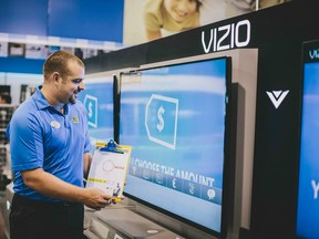 A VIZIO Smart TV is on display at Best Buy.