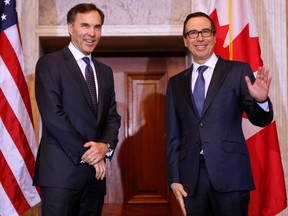 Treasury Secretary Steven Mnuchin, right, with Canadian Finance Minister Bill Morneau in Washington.