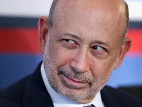 Goldman Sachs Group Inc. reduced Chief Executive Officer Lloyd Blankfein's annual compensation 27 per cent.