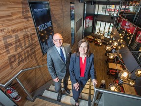 Boston Pizza's Alan Howie, EVP, Operations and Development and Helen Langford, SVP Foodservices and Design at the company's soon to be opened location at the corner of Front Street and John Street.