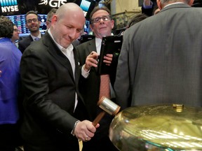 Canada Goose CEO & President Dani Reiss rings a ceremonial bell as his company's IPO begins trading on the floor of the New York Stock Exchange, Thursday, March 16, 2017.