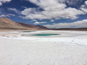 Water pooling on lithium salar owned by Argentina Lithium and Energy Corp.
