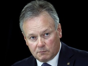 Stephen Poloz, governor of the Bank of Canada, listens during a press conference following his speech at Durham College in Oshawa, Ont. on Tuesday, March 28, 2017.
