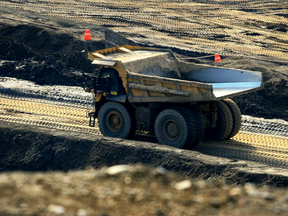 A 400-ton heavy hauler truck makes its way across a Shell Albian Sands' Jackpine Mine pit, north of Fort McMurray, Alberta.