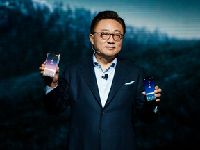 D.J. Koh, president of mobile communications business for Samsung Electronics Co., unveils the new Galaxy S8